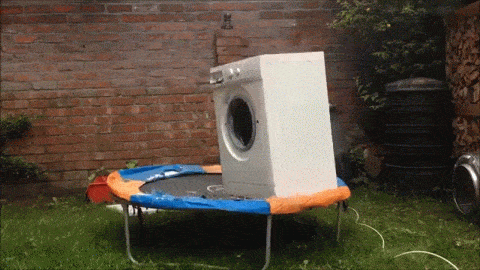 a brick in a washing machine on a trampoline that is all huffpost medium