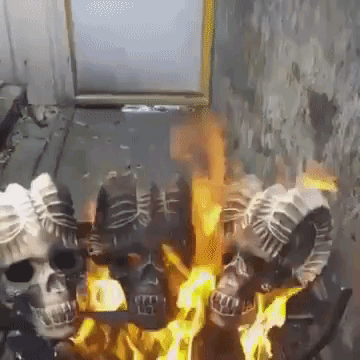a hilariously irreverent demon skull fireplace log medium