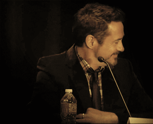 robert downey jr laughing gifs find share on giphy medium