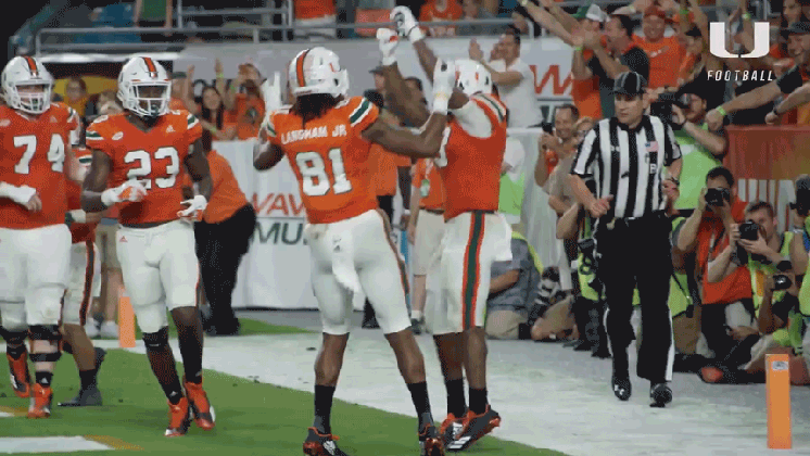 jumping college football gif by miami hurricanes find share on giphy medium