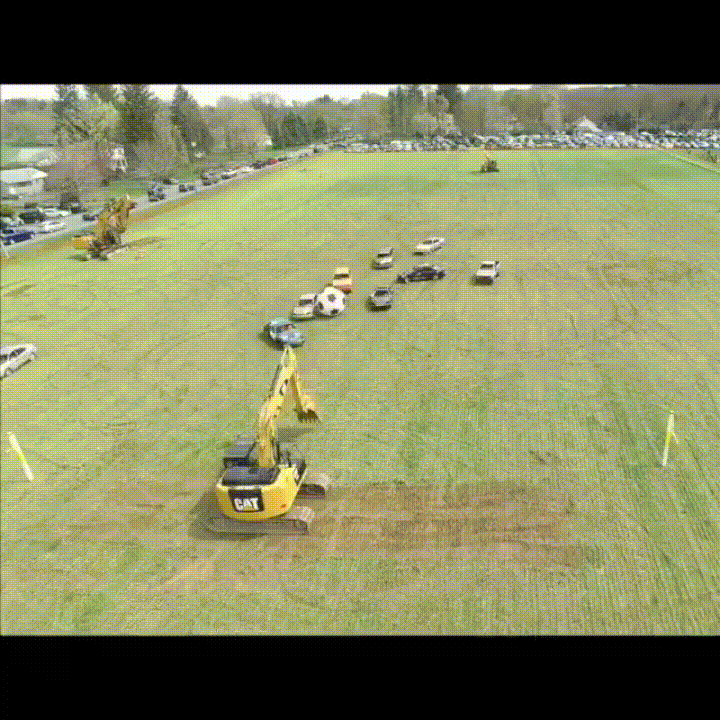 excavator playing goalie in giant soccer game gif by jon excavator medium