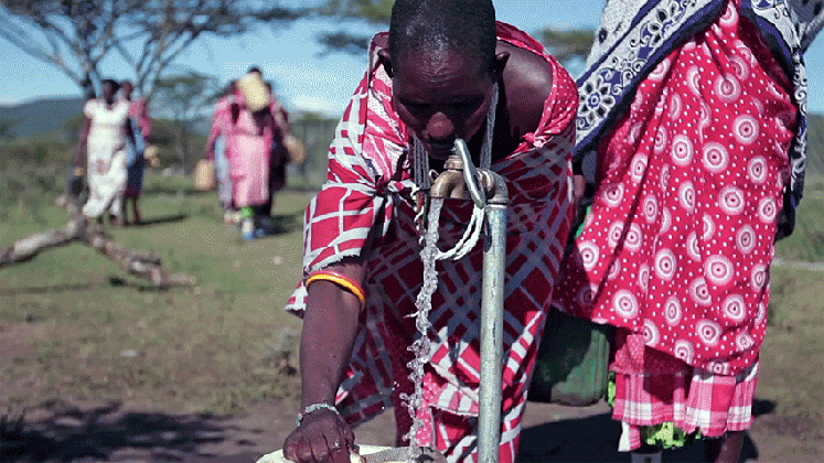 the ripple effect of clean water focus on tanzanian communities medium