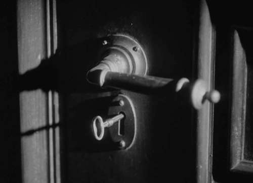 film black and white white horror black old door key ghost medium
