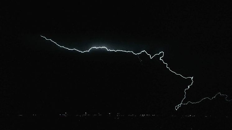 a stunning timelapse of lightning piercing through the skies shot in medium