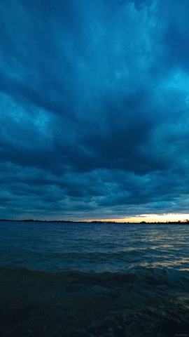 cinemagraph gif nature cinemagraph rain sunset clouds waves gif medium