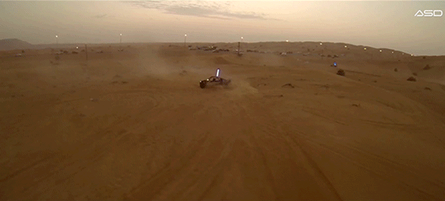 dune buggies race on the verge of crashing in spectacular aerial video medium
