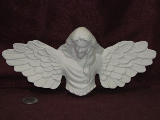 ceramic bisque angel looking down christmas ornament doc holliday medium