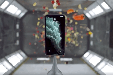 watch apple throw cake and many other things at the iphone 11 pro in its new ads amkio throwing pc small