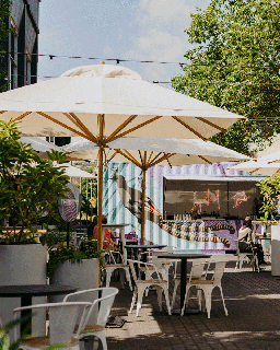 up your alfresco game at this new pop shipping container bar and eatery urban list melbourne north star umbrella
