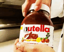 nutella gif nutella yummy knife discover share gifs small