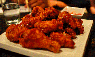 https://cdn.lowgif.com/small/b9d1909a4363eda5-what-do-you-consider-the-proper-way-to-eat-chicken-wings.gif