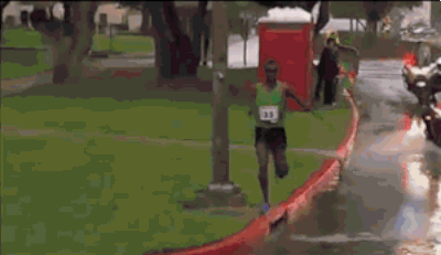 this guy running into a puddle 35 guys in a real hurry small