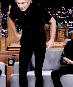 jimmy fallon hes being cute by looking at him with those eyes gif small
