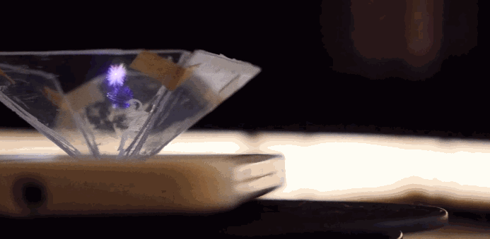https://cdn.lowgif.com/small/ed7afe9416557a58-turn-your-smartphone-into-a-hologram-projector-using-everyday-items.gif